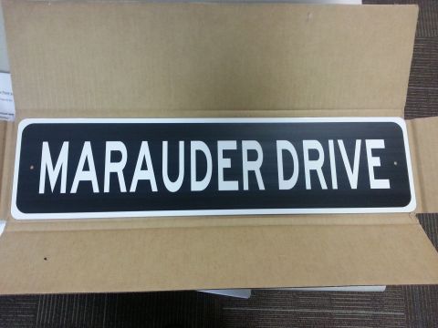 2003 Mercury Marauder - A street sign reading MARAUDER DRIVE is shown inside a cardboard box.