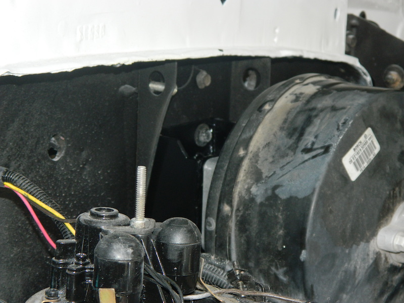 Brake booster and master cylinder assembly with visible part numbers