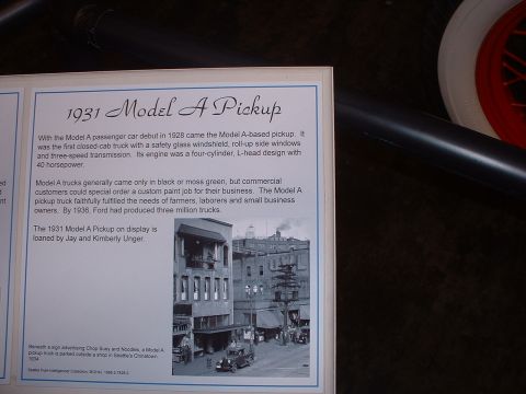 1999 Ford Crown Victoria - Display document details a 1931 Model A Pickup and includes a historical street photograph.