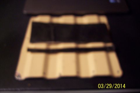 1990 Ford Bronco - Access panel for fuel floor, likely from a vehicle.
