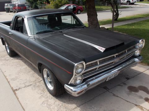 1967 Ford Ranchero - This 1967 Ford Ranchero features a matte black finish and a prominent hood scoop with 429 badging.
