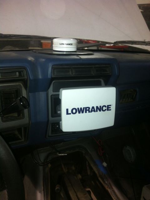 1986 Ford Bronco - A Lowrance GPS unit is mounted on the dashboard of this vehicle's interior.