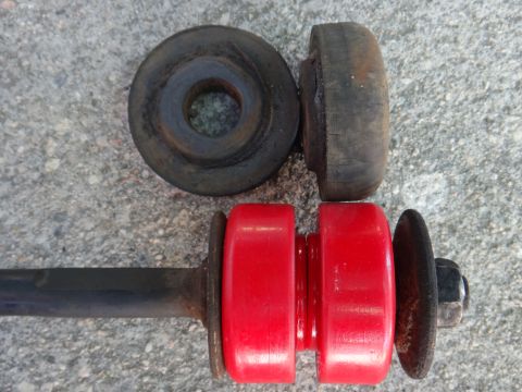 1993 Ford Taurus - Comparison of old rubber and new polyurethane suspension bushings.