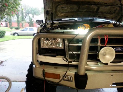 1992 Ford Bronco - This was a process. Having the push bumper in the way made things really difficult. After some maneuvering I was able to get the bezel out.…