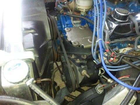 1976 Ford Ranchero - The engine bay of a vehicle is shown, various components and wiring.