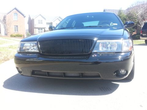 2003 Mercury Marauder - Front view of a black 2003 Mercury Marauder with a custom grille.