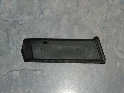 1996 Ford Bronco - A black gun magazine is shown against a gray background.