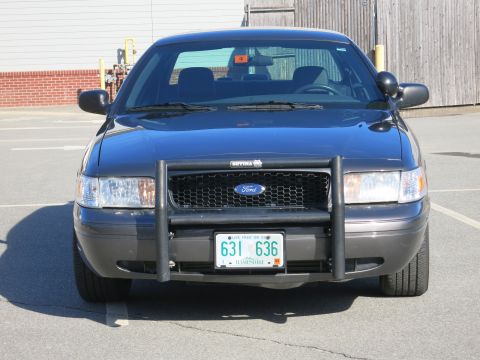 2001 Ford Crown Victoria - Front view of a 2001 Ford Crown Victoria police car equipped with a push bumper.