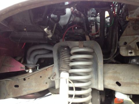 1992 Ford F-150 - Here is the passenger side before. I got the wheel and wheelwell out in about 5 minutes. This is a muct for anyone doing headers.