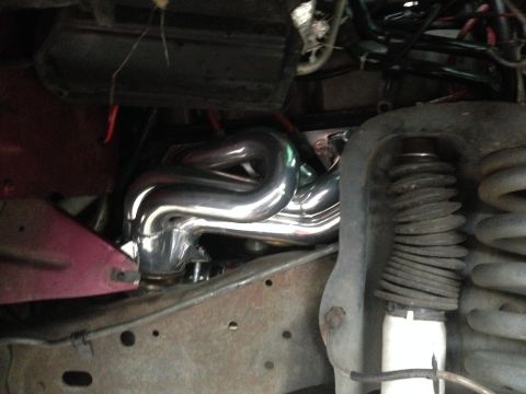 1992 Ford F-150 - Bassani header in place. Snug fit. I think I still have a leak on this side though...