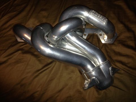 1992 Ford F-150 - Chrome exhaust manifold with 'BASSANI' logo visible, likely an aftermarket part.