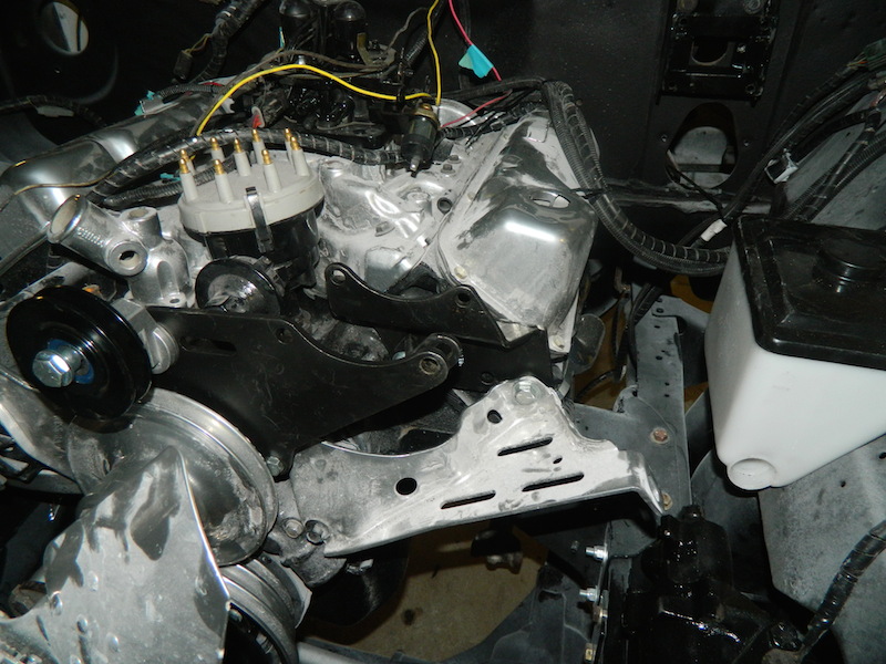 Engine bay with distributor cap and wires visible