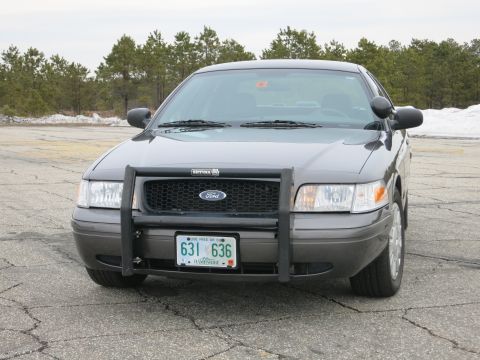 2001 Ford Crown Victoria - Front view of a 2001 Ford Crown Victoria equipped with a push bar.