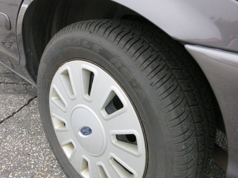 2001 Ford Crown Victoria - The Ford logo is visible on the hubcap of this Crown Victoria's wheel.