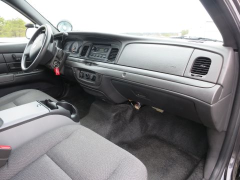 2001 Ford Crown Victoria - Interior view of a 2001 Ford Crown Victoria, likely a police vehicle.