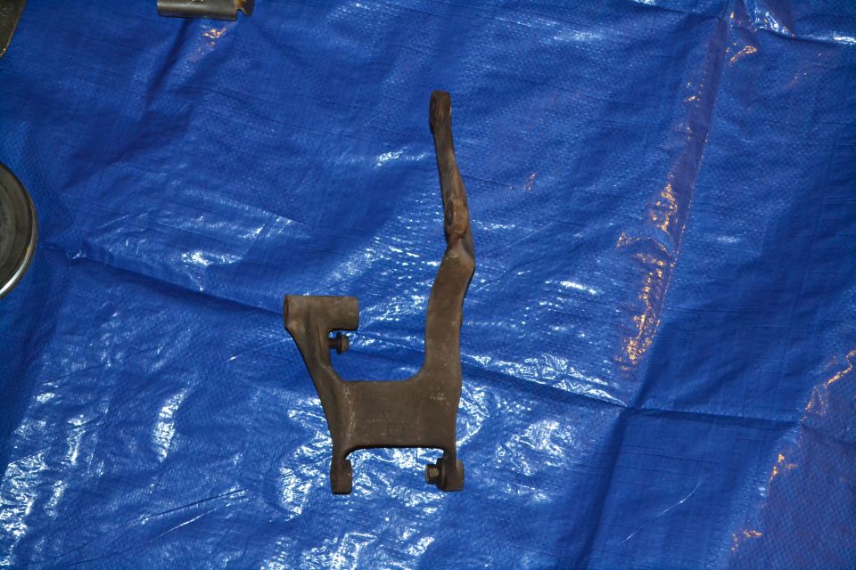 Metal bracket on blue tarp