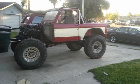 1968 Ford Bronco - This modified 1968 Ford Bronco features a lifted suspension and oversized tires, with the front fender removed.