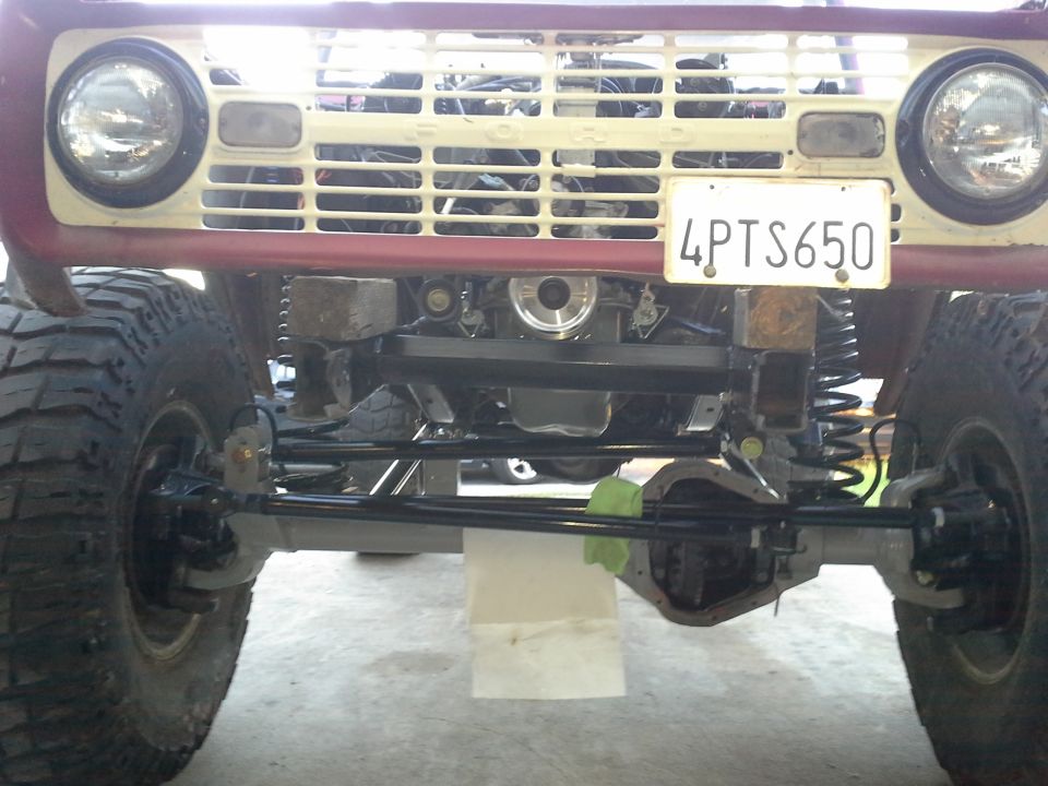 1968 Ford Bronco front view, showing lifted suspension and engine bay