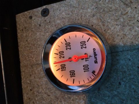 1991 Ford F-150 - A close-up of a Sunpro temperature gauge is visible.