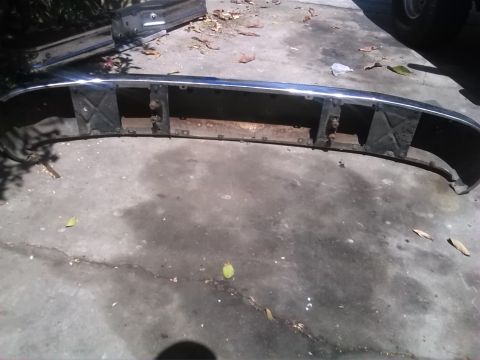 1992 Ford Bronco - Front bumper assembly for a Ford Bronco, showing chrome trim and internal structure.