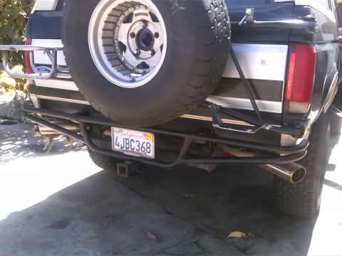 1992 Ford Bronco - Rear view of a 1992 Ford Bronco, equipped with a spare tire and a custom bumper.