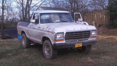 1979 Ford Bronco - This 1977 Ford F-150 pickup truck is shown from the front-three-quarter view.