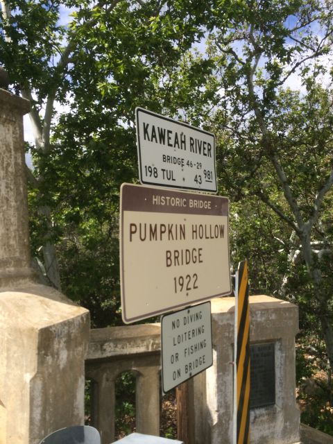 1996 Ford C-350 (Centurion Conversions) - Signs indicate the Pumpkin Hollow Bridge, built in 1922, crosses the Kaweah River.