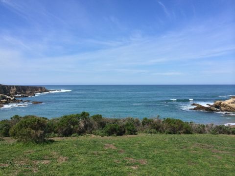 1996 Ford C-350 (Centurion Conversions) - A view of the ocean and cliffs on a clear day.