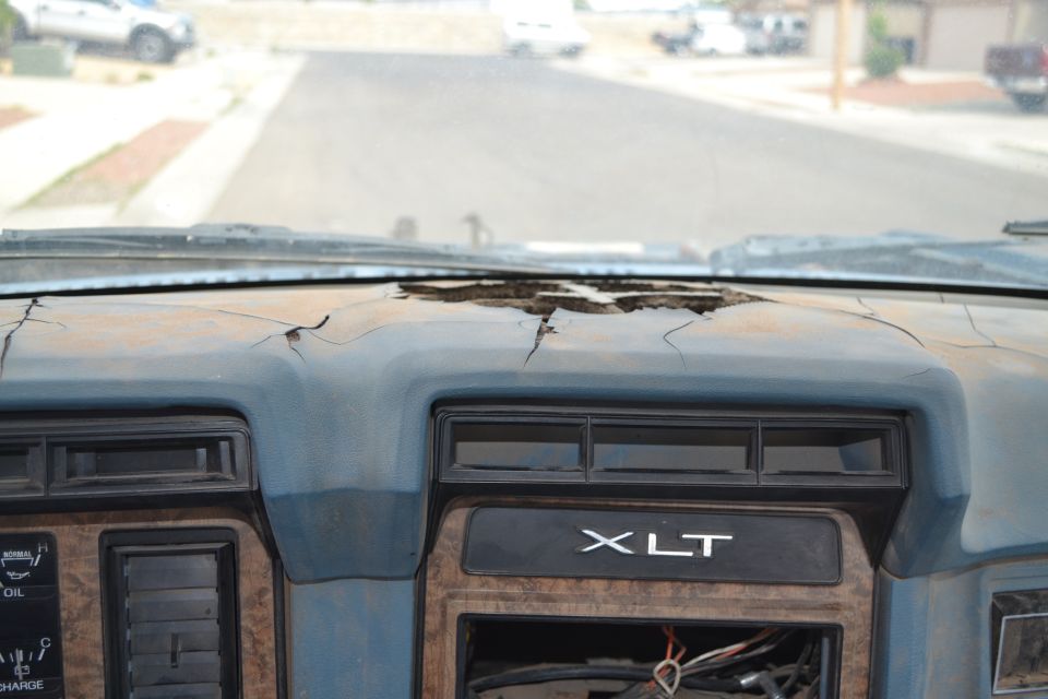 1981 Ford F-250 interior showing cracked dashboard with XLT trim and gauges