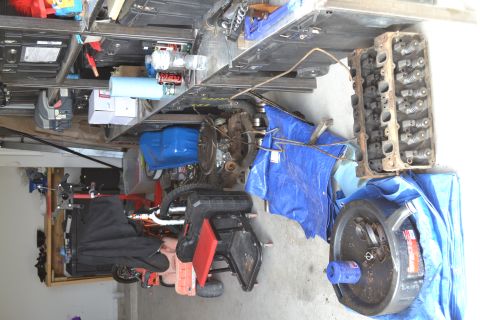 1981 Ford F-250 - Garage scene with engine components and various items stored around.
