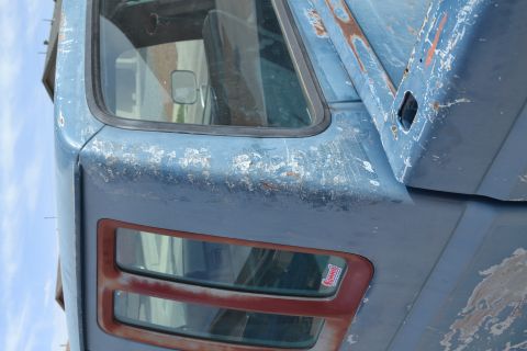 1981 Ford F-250 - The weathered blue paint and visible rust indicate this truck is likely from the early 1980s, not specifically 1981.