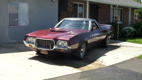 1972 Ford Ranchero - This 1972 Ford Ranchero is parked in front of a house with a brick and stucco exterior.
