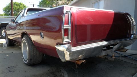 1972 Ford Ranchero - Rear view of a 1972 Ford Ranchero with a dark red finish.