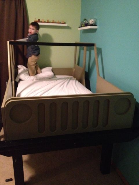 2005 Jeep Wrangler - Child's bed frame designed to resemble a Jeep's iconic grille and front end.