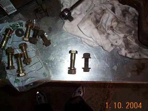 1992 Ford Bronco - The new mounting bolts I'm using are on the left versus the old ones, these are 5/8th inch thick with about a half inch shank, they're not…