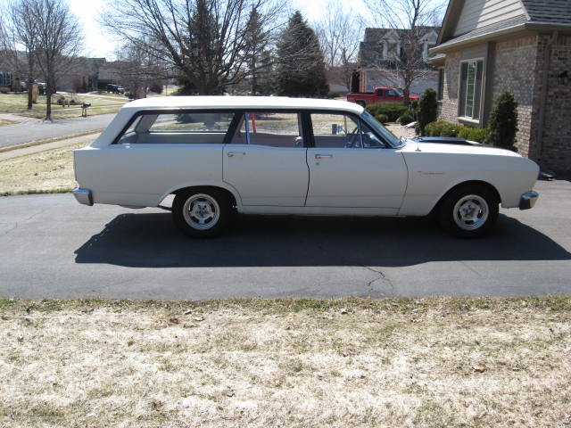 White 1966 Ford Falcon station wagon, side view