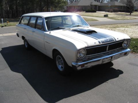 1966 Ford Falcon - This 1966 Ford Falcon station wagon features a distinctive black hood scoop and racing stripes.