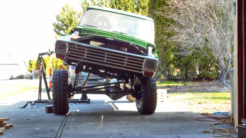1967 Ford F-250 - This modified 1967 Ford F-250 pickup features a lifted suspension and a custom front grille, suggesting it is undergoing a build or restora…
