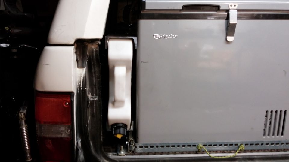 1985 Toyota 4Runner rear with portable refrigerator and water jug