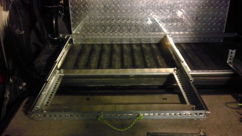1985 Toyota 4Runner - Custom slide-out drawer system installed in a truck bed, diamond plate and a rope handle.
