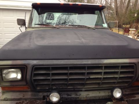 1979 Ford Bronco - Front view of a 1979 Ford Bronco, showing its distinctive grille and headlights.
