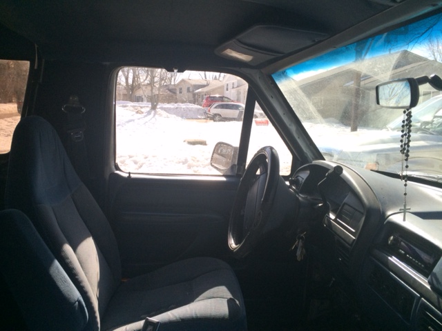 Interior view of 1996 Ford Bronco showing driver's seat and dashboard