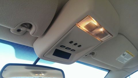 2000 Mercury Grand Marquis - Interior view of a vehicle's overhead console, showing controls and lights.