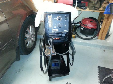 1992 Ford Bronco - put it together in about 20 minutes. holds all of my welding stuff. not a bad piece of equipment for $40.