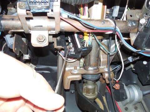1997 Chevrolet Silverado 3500 - I used this long right-angle pick to release the block from the flimsy frame, then pulled the block down enough to back out the red 7mm bol…