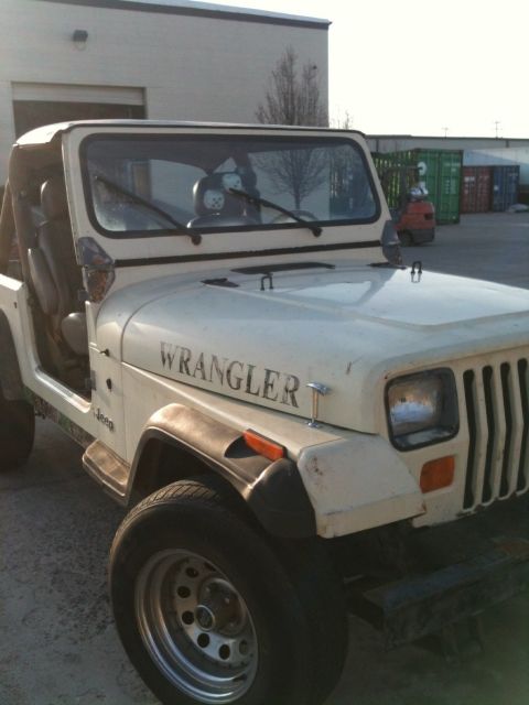1985 Yugo GVX - This Jeep Wrangler is shown from a 3/4 front view, with its doors removed.