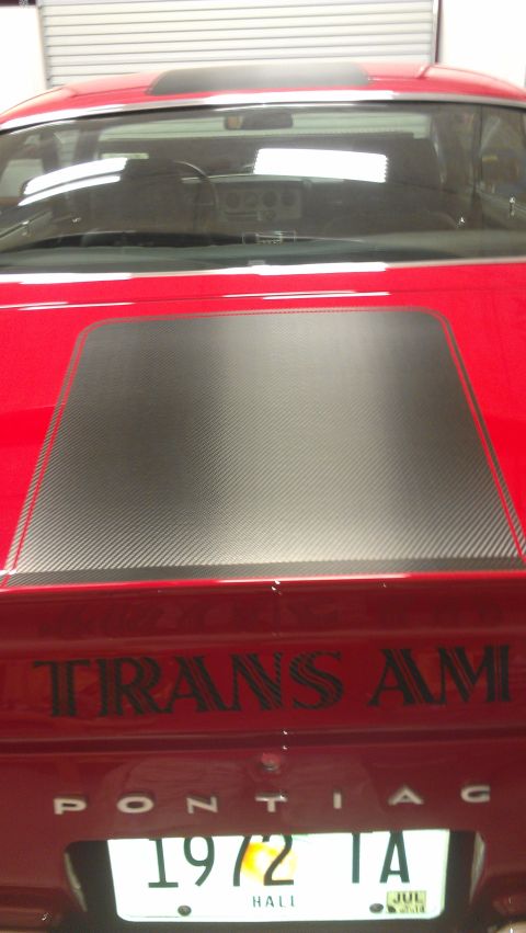 1972 Pontiac Trans Am - Rear view of a 1972 Pontiac Trans Am its iconic badging and a carbon fiber hood decal.