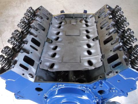 1967 Ford Mustang - Engine block and cylinder heads with valve springs visible, ready for assembly.