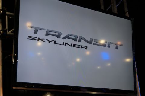 1993 Ford Taurus - The Transit Skyliner logo is displayed on a large screen.