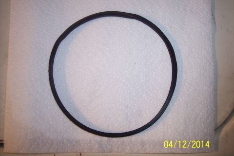 1990 Ford Bronco - A rubber O-ring is shown on a paper towel, likely before installation or after removal.